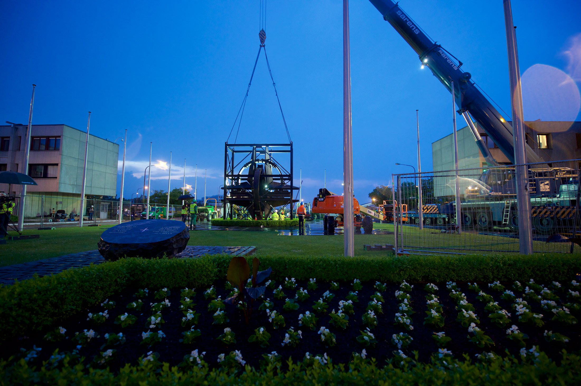 NATO star being hoisted by crane in May 2016