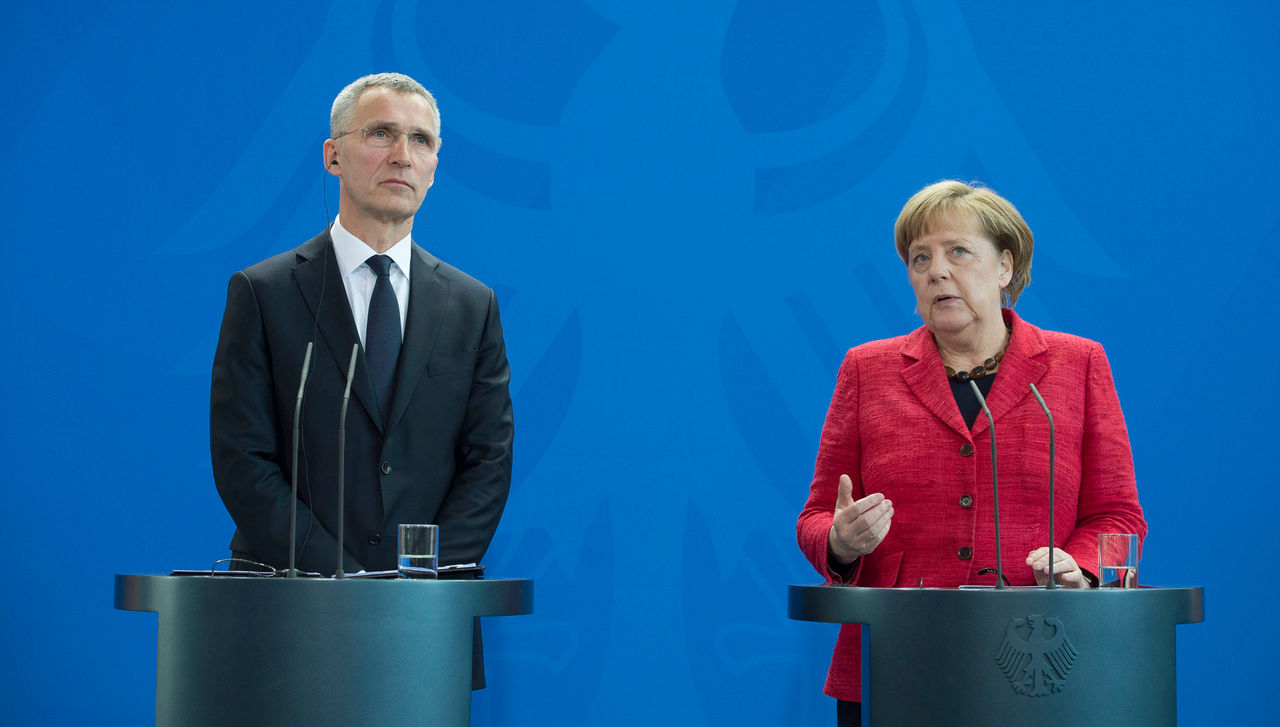 Joint press point with NATO Secretary General Jens Stoltenberg and German Chancellor Angela Merkel