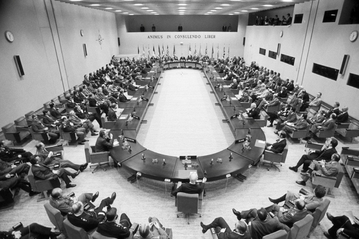 The motto on the wall of conference room 16