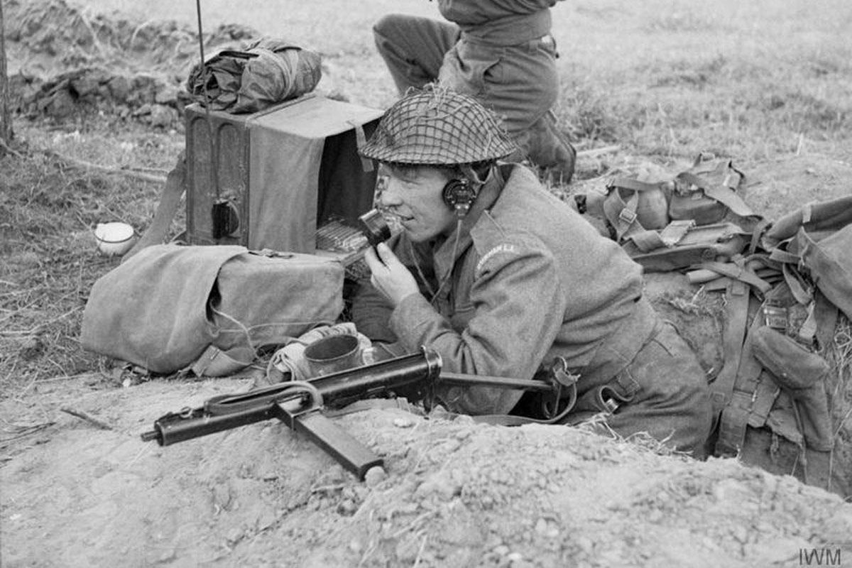 Men of the Durham Light Infantry operate a radio and keep watch for the enemy, near Bayeux, Normandy, 11 June 1944. © IWM (B 5378)