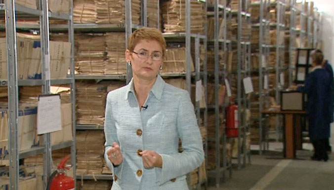 Oana in the Securitate archives investigating her own secret police files, 2009