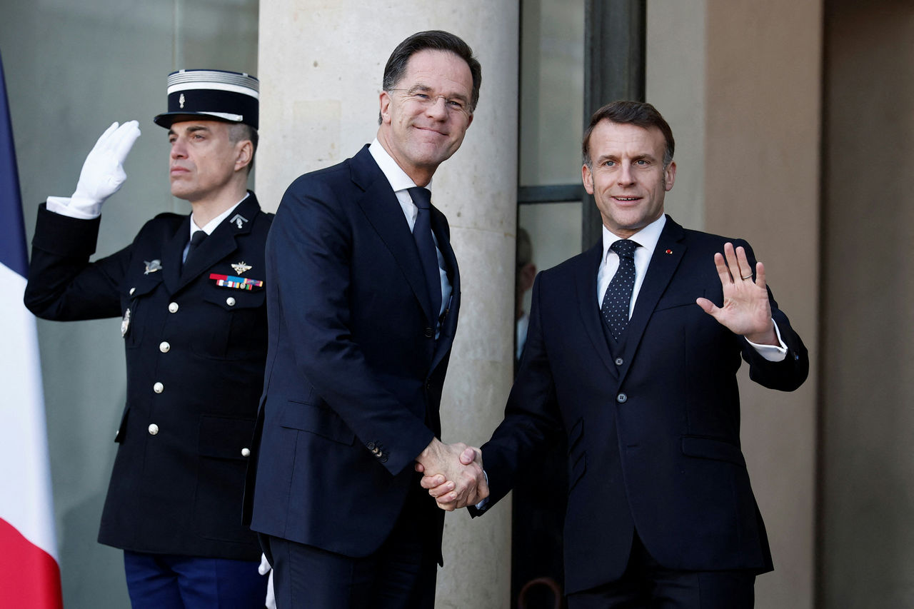 President Emmanuel Macron of France shakes hands with NATO Secretary General Mark Rutte as he arrives for a summit of the Coalition of the Willing at the Elysee Palace in Paris, France.